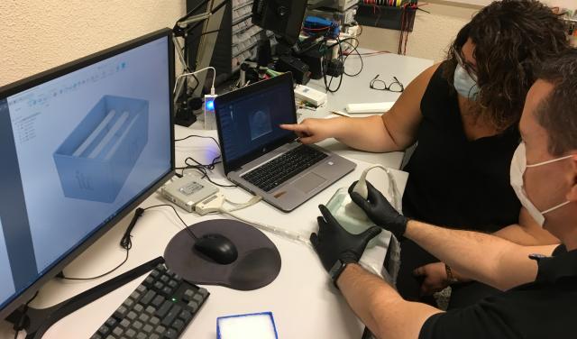 Javier González Fernández and Natalia Arteaga Marrero, ITC and IACTEC engineers, during the inspection of the phantom carried out at the ITC Biomedical Engineering Laboratory. Credit: Enrique Villa