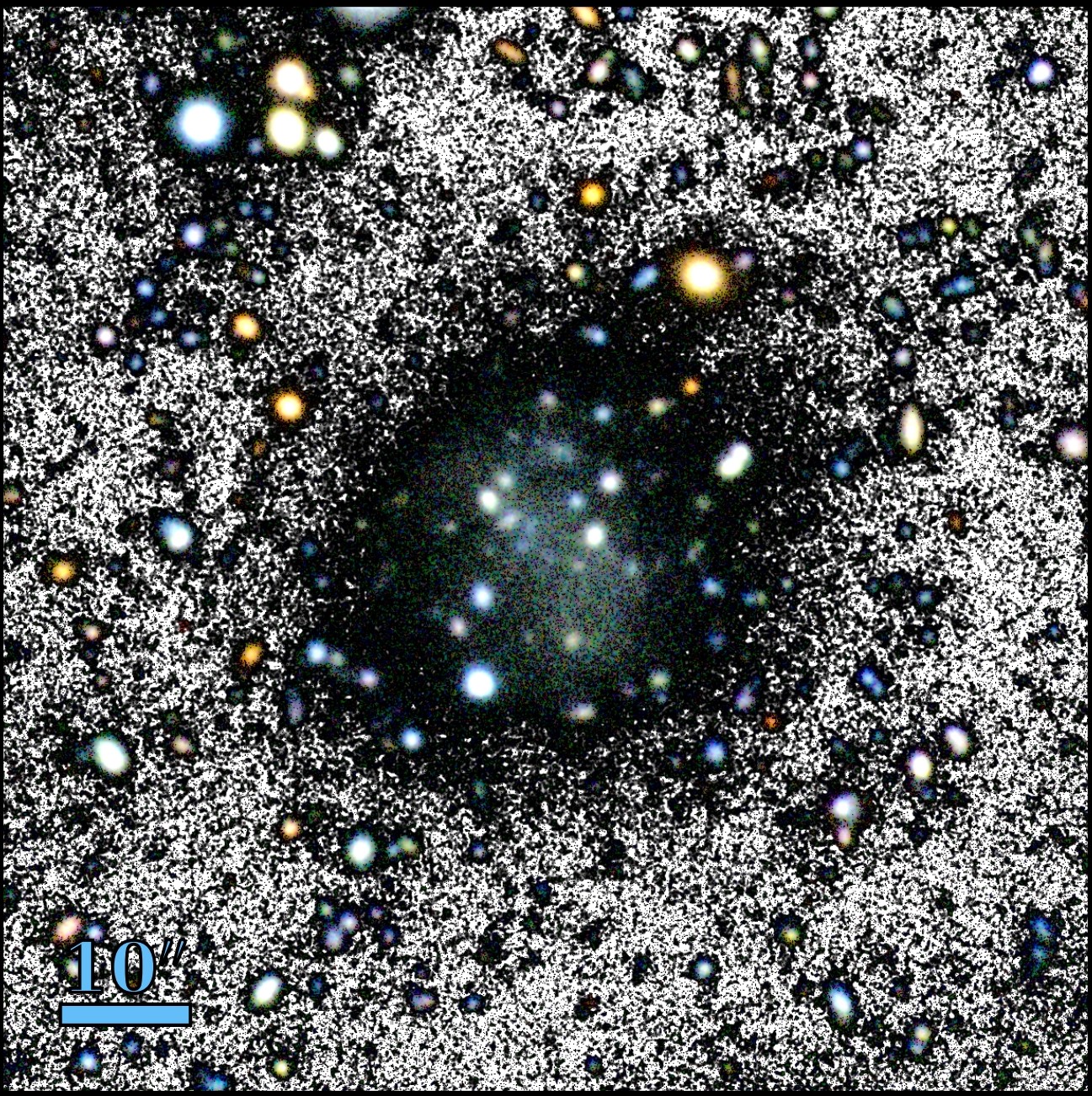 The Nube galaxy. The figure is a composition of a colour image and a black and white image, to pick out the background. Credit: GTC/Mireia Montes