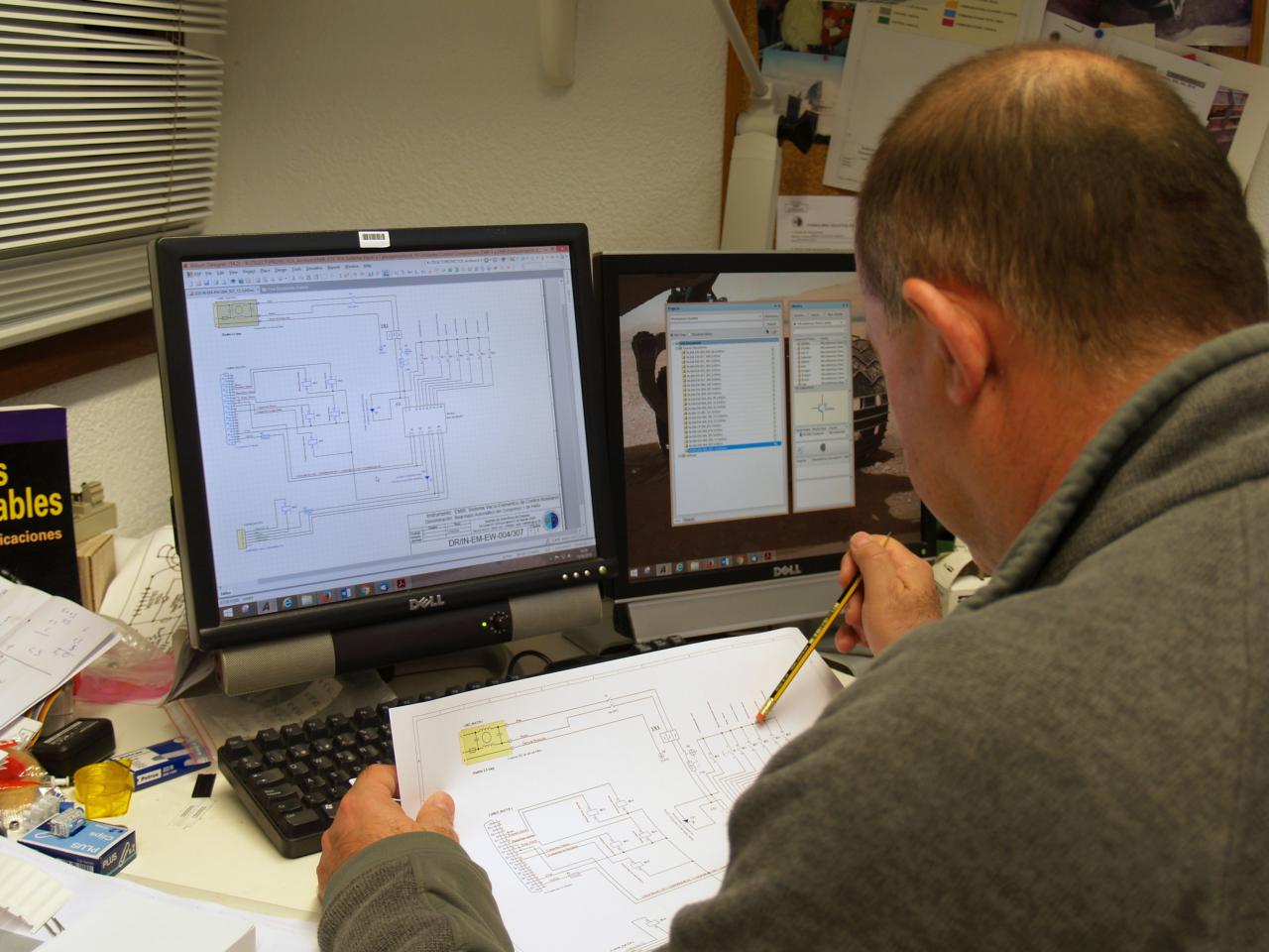 View of a technician working on an electronic design 