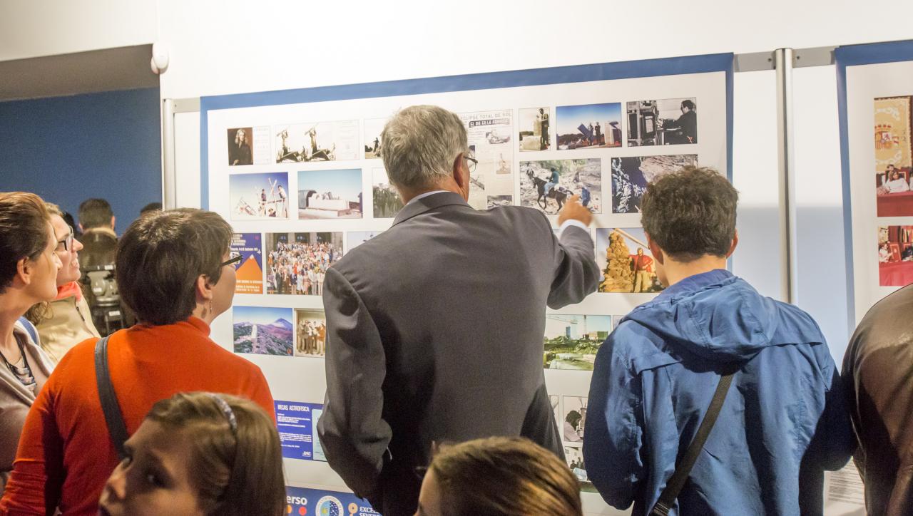 Visitors to the "Lights of the Universe" exhibition in one of the rooms of the Art Gallery of the Institute of the Canaries, Cabrera Pinto (La Laguna)