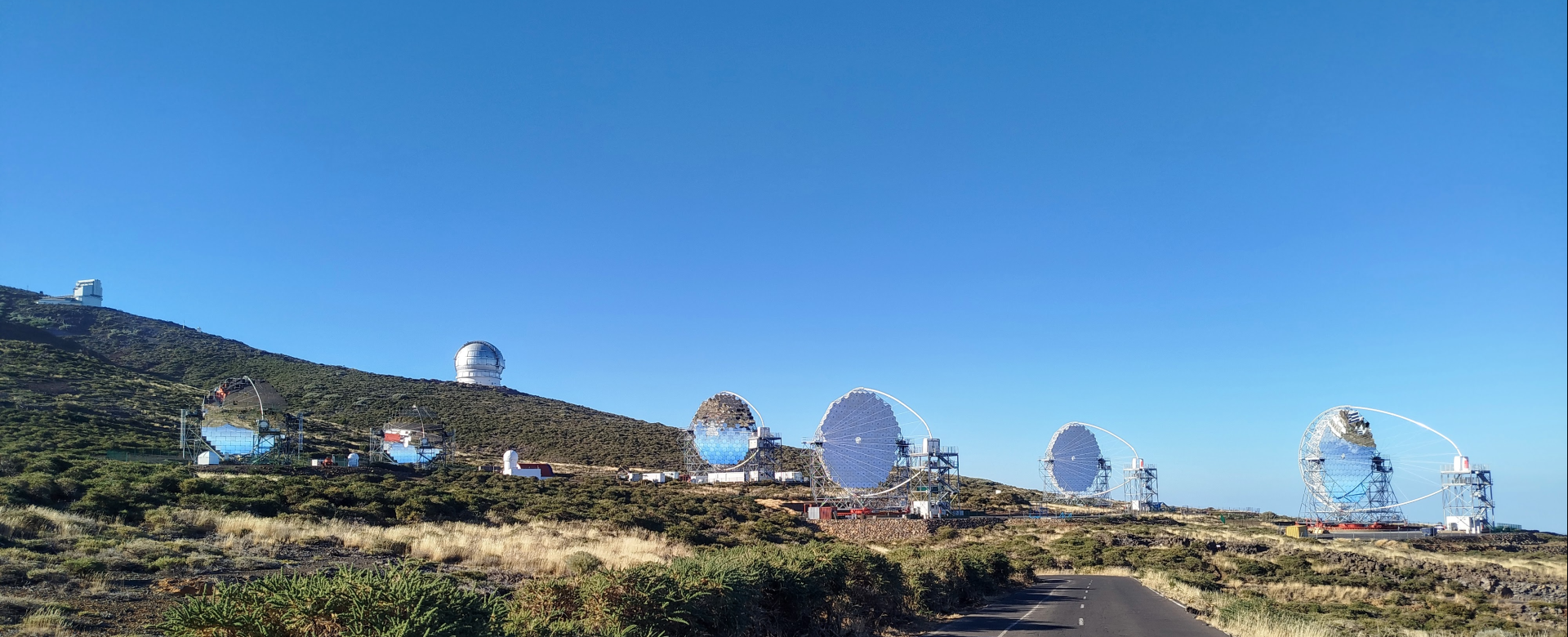 A panoramic view of the Roque de los Muchachos Observatory on La Palma, with the new LST telescope array in the foreground