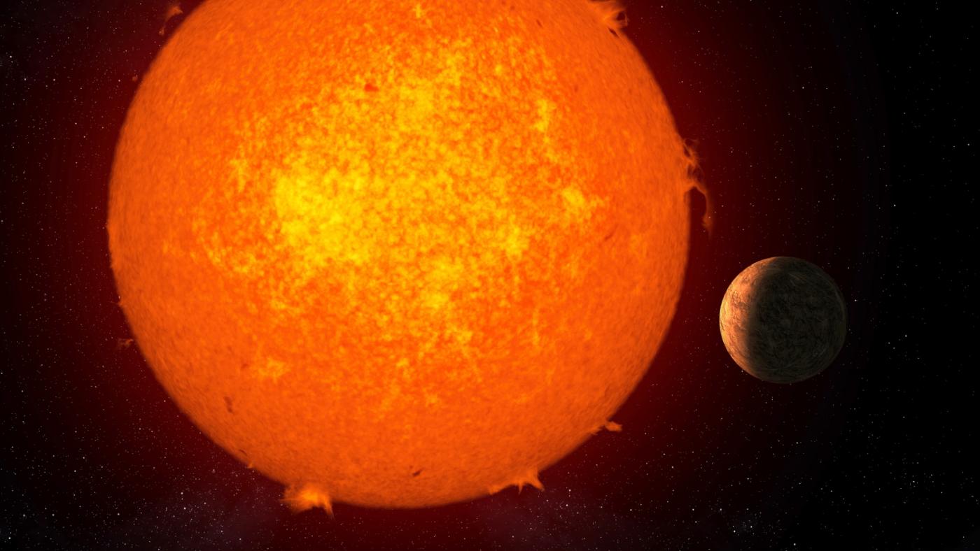 Representación artística del exoplaneta rocoso Próxima b orbitando su estrella