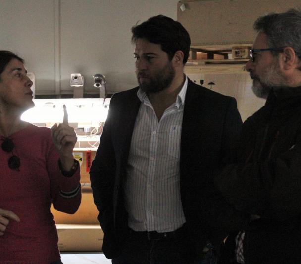 The deputy director of the IAC, the mayor of Güímar and the manager of the Teide Observatory inside the dome of the Optical Ground Station