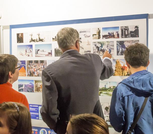 Visitors to the "Lights of the Universe" exhibition in one of the rooms of the Art Gallery of the Institute of the Canaries, Cabrera Pinto (La Laguna)