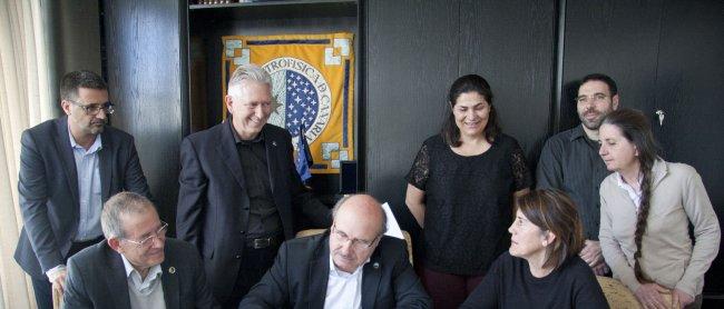 Left to right: Jesús Burgos, head of general administration of the IAC; Carlos Martínez, deputy director; Campbell Warren, executive secretary; Rafael Rebolo, director; Begoña García, head of the instrumentation division; Casiana Muñoz, chair of the SUCOS