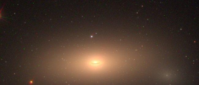 Color image of the Hubble Space Telescope (HST) of the massive relic galaxy NGC1277. The image was constructed using filters F475W, F625W and F850LP that cover the visible range of radiation. The data was obtained with the HST program GO-14215 (whose prin