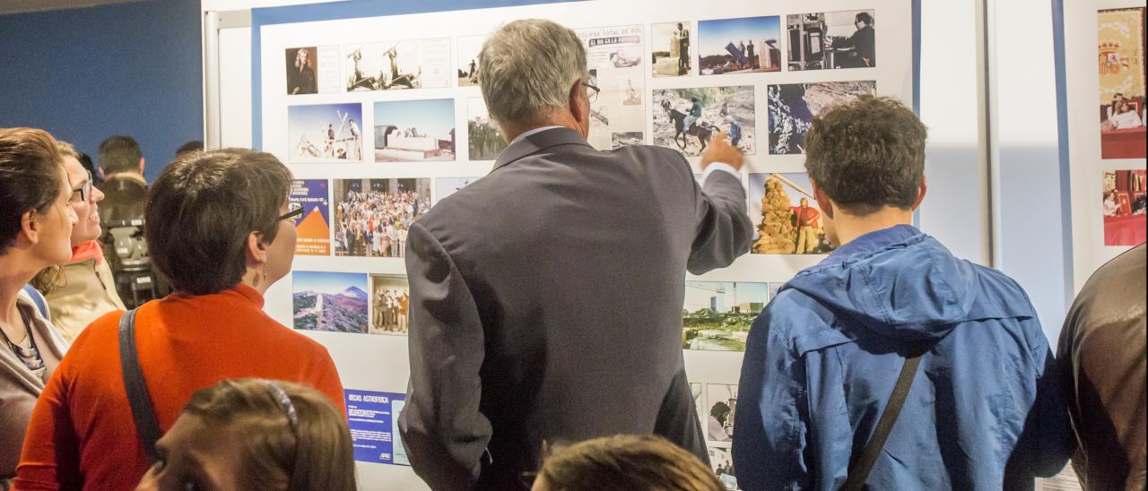 Visitors to the "Lights of the Universe" exhibition in one of the rooms of the Art Gallery of the Institute of the Canaries, Cabrera Pinto (La Laguna)