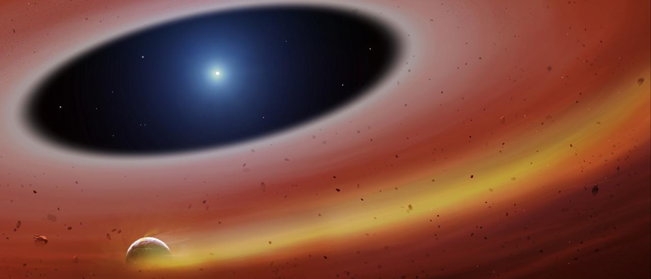 Artist’s impression of a planetary fragment orbits the star SDSS J122859.93+104032.9, leaving a trail of gas in its wake. Credit: University of Warwick/Mark Garlick.