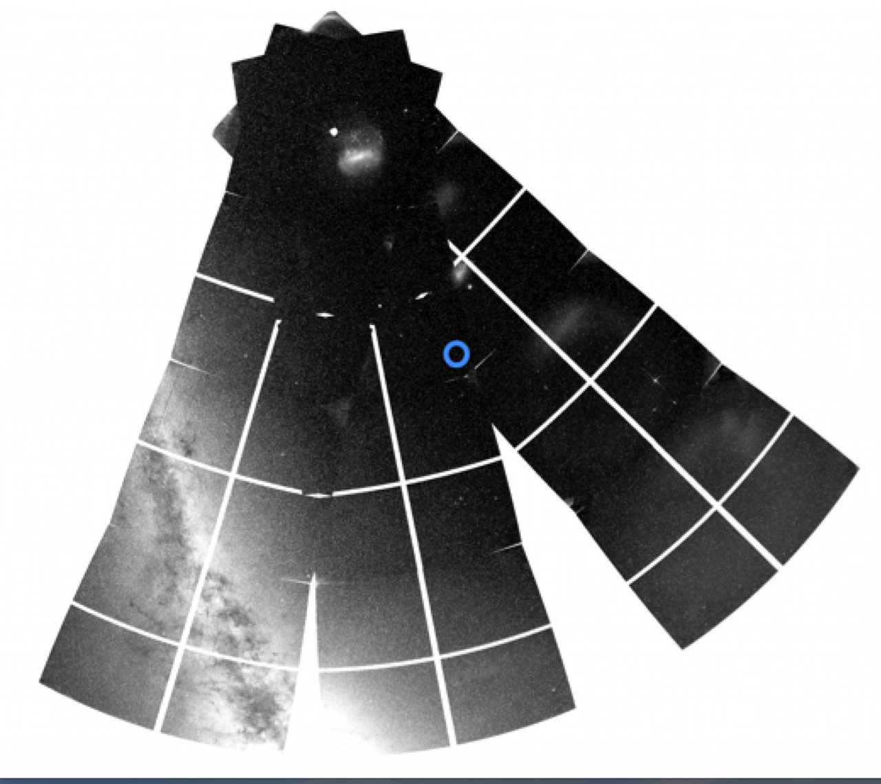 A snapshot from TESS of part of the southern sky showing the location of ν Indi (marked by the blue circle), the plane of the Milky Way (bottom left) and the southern ecliptic pole (top). These snapshots come from data collected in TESS observing sectors 1, 12 and 13 Credit: J. T. Mackereth.