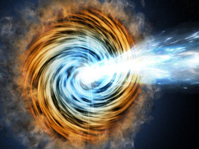 In active galaxies as matter falls toward the supermassive black hole at the galaxy's center, some of it is accelerated outward at nearly the speed of light along jets. When one of the jets happens to be aimed in the direction of Earth, as illustrated her