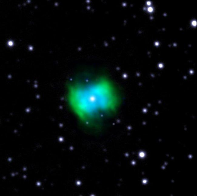 False color image of the planetary nebula NGC 6778. In blue, the emission associated with weak lines of ion O++ recombination, taken with the OSIRIS tunable filter blue instrument in the GTC. In green, emission of the same ion in the excited lines by coll