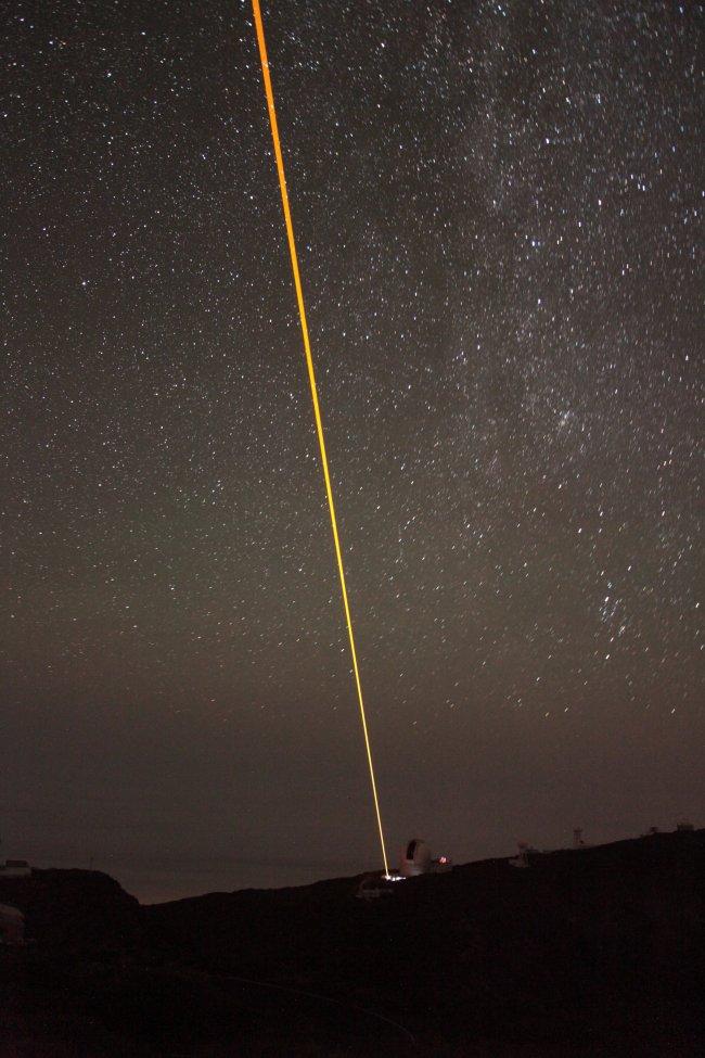 Image of the ESO sodium laser propagated through the lower atmosphere during the experiment with the CANARY system of adaptive optics on the WHT. Credit, CANARY-WLGSU Consortium.