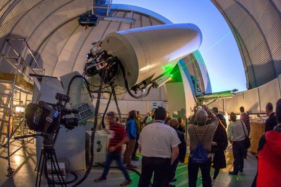 Participants in Tweetup #SpaceOptics, organized by ESA and the IAC inside the dome of the Optical Ground Station (OGS) of the Teide Observatory. Credits: Daniel López/IAC.