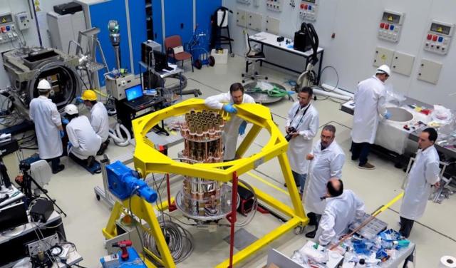IAC engineers working in one of the Assembly, Integration and Verification Rooms (AIV).