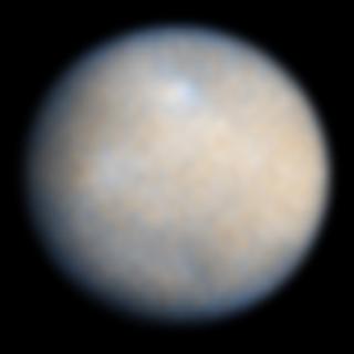 Ceres en color real observado en 2004 por el Telescopio Espacial Hubble a una distancia de 1, 64 Unidades Astronómicas. Crédito: NASA, ESA, J. Parker (Southwest Research Institute), P. Thomas (Cornell University), and L. McFadden (University of Maryland, College Park)