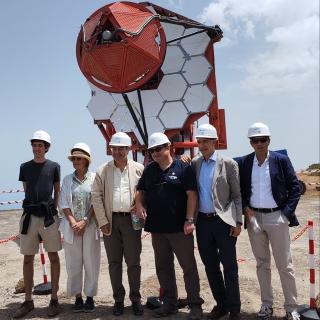 INAF and IAC representatives next to the first telescope of the ASTRI network INAF and IAC representatives next to the first telescope of the ASTRI network