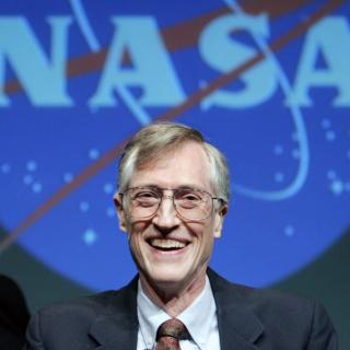 Portrait of John Mather during a talk