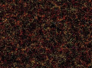 This is one slice through the map of the large-scale structure of the Universe from the Sloan Digital Sky Survey and its Baryon Oscillation Spectroscopic Survey. Each dot in this picture indicates the position of a galaxy 6 billion years into the past. Th