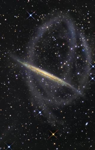 Image of the stellar tidal stream surrounding the spiral galaxy NGC 5907 obtained with an amateur robotic telescope in the mountains of New Mexico.Credit: R. Jay Gabany