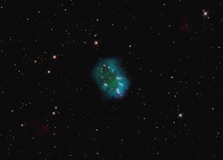 Space Telescope (HST) image of the planetary Nebula "The Necklace" discovered in 2005 by our group during the IPHAS H-alpha mapping of the Galactic Plane (Isaac Newton Telescope at Roque de los Muchachos Observatory). This Planetary became a key object for understanding the formation of bipolar nebulae from binary progenitor stars (Corradi+2011). Planetary Nebula "The Necklace"