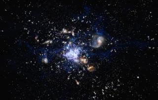 Formación de un cúmulo de galaxies en el universo lejano, sus miembros están interactuando unas con otras y formando nuevas estrellas de forma muy activa. Crédito: ESO/M. Kornmesser. Proto-cúmulo de galaxias