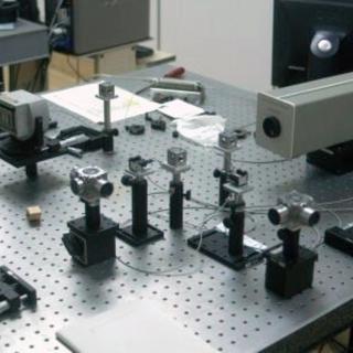 View of the Differential interferometer in the laboratory View of the Differential interferometer in the laboratory. Small optical and electronic devices aligned on a laboratory table